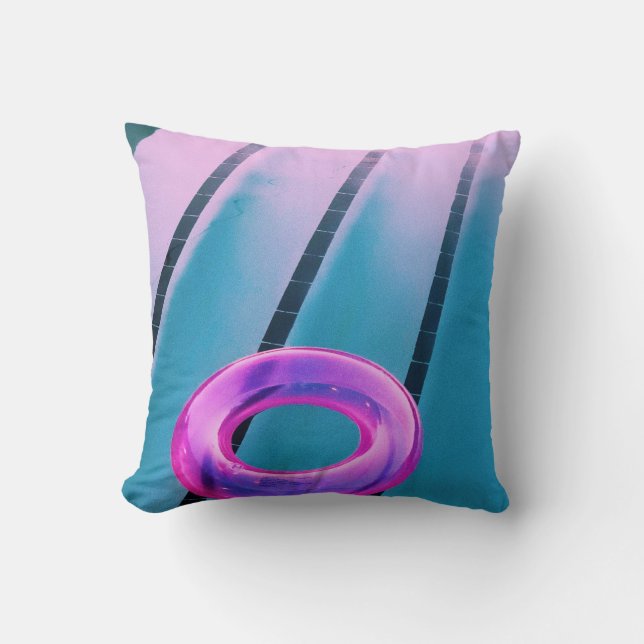 Pink inflatable ring on pool cushion (Front)