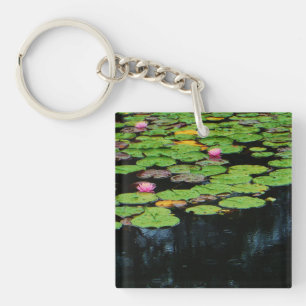 pink lotus black water key ring
