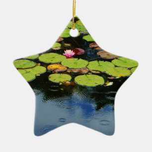 Pink lotus in Rain Ceramic Ornament