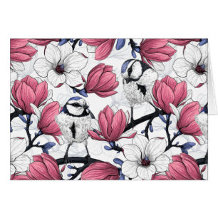 Pink magnolia and blue tit birds