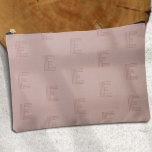 Pink modern Monogram pattern Accessory Pouch<br><div class="desc">Discover our Pink Monogram Simple Modern Accessory Pouch, the perfect blend of style and practicality for the contemporary woman. This pouch, adorned in a refined dusty pink shade, showcases an elegant monogram pattern that seamlessly combines minimalist charm with a modern flair. Ideal for both golf lovers and those in search...</div>