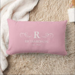 Pink Monogram Lumbar Pillow<br><div class="desc">Bring warmth and elegance to your home with this customisable blush pink lumbar pillow. Easily personalise with your monogram, family name, and est. date, making it a meaningful accent for your living room, bedroom, or entryway. The soft pale pink backdrop offers a soothing, contemporary feel that complements a variety of...</div>