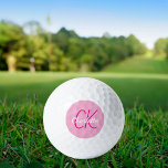 Pink name monogram initials golf balls<br><div class="desc">Pink background,  hot pink and white text. Personalise and add your monogram initials and name.  The name is written with a modern hand lettered style script.</div>