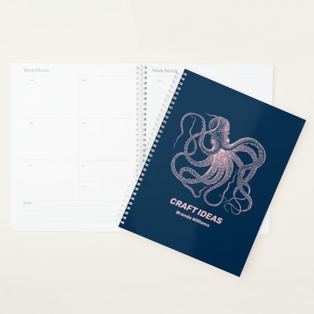 Pink octopus on dark blue planner (Display)