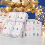 Pink Personalised Christmas Wrapping Paper<br><div class="desc">This adorable wrapping paper features boho Christmas trees in whimsical shades of pink,  yellow,  green and red and a personalised quote that says "Merry Christmas" with your loved one's name.</div>