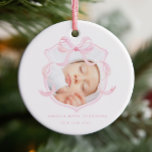 Pink Photo Baby Girl Announcement Ceramic Ornament<br><div class="desc">This birth announcement ornament features a soft and elegant design. It displays a photo of a newborn baby framed by a delicate watercolor pink ribbon in the shape of a bow. With a pink and white colour scheme, it makes a perfect choice for announcing the arrival of your baby girl....</div>