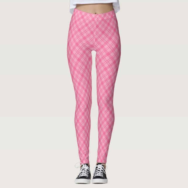 Pink plaid leggings displayed front view, worn  (Front)