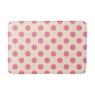Pink polka dots on cream bath mat