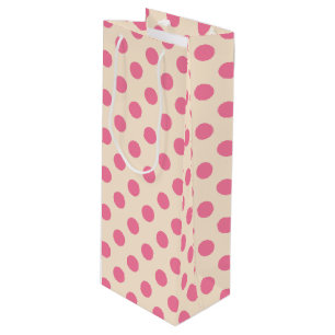 Pink polka dots on cream wine gift bag