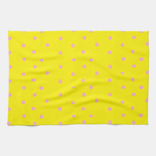 Pink polka dots on yellow tea towel