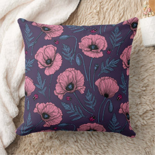 Pink poppies on dark violet cushion