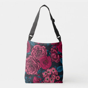 Pink, red and bi-colour roses with blue leaves on crossbody bag