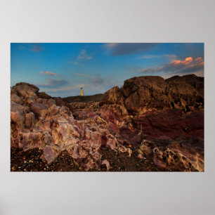 Pink rocks and Llanddwyn Island Poster