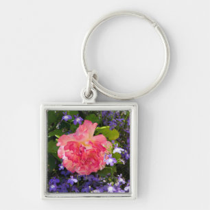 Pink rose flowers among blue lobebelia flowers pos key ring