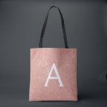 Pink Rose Gold Sparkle Elegant Monogram Book Bag<br><div class="desc">Blush Pink - Rose Gold Faux Sparkle Glitter Elegant and Modern Luxury Chic Monogram Book Bag. This cute and pretty girly Bag can be customised to include your initial and first name and is a perfect Bridal Shower, Sweet 16, 13th, 15th, 16th, 18th, 21st, 30th, 40th, 50th, 60th, 70th, 80th,...</div>