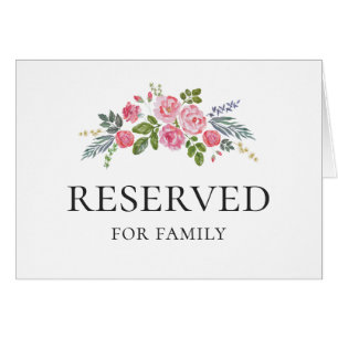 Pink roses. Garden flowers. Wedding reserved sign