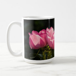 Pink roses in golden garden light coffee mug