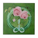 Pink Roses Majolica Faux Relief Repro Antique Ceramic Tile<br><div class="desc">Pretty pink roses with aqua blue ribbons and wreath against a green background make this reproduction c. 1900 art nouveau Richards tile a standout. Can be used as a wall or backsplash tile for kitchen, laundry, bath, or shower. Personalise for useful, unique wedding favours or gifts. Available in 4.5 and...</div>