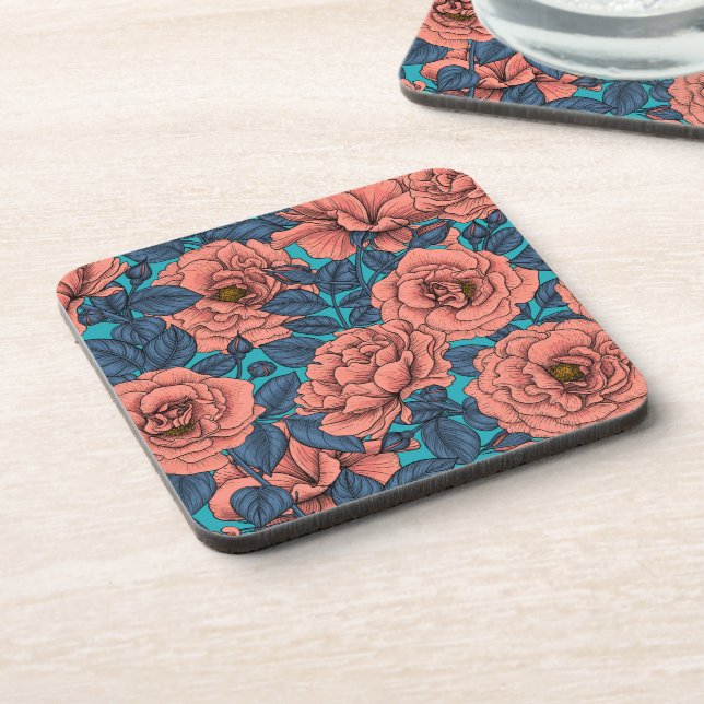 Pink roses with blue leaves on blue coaster (Left Side)