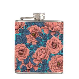 Pink roses with blue leaves on blue hip flask