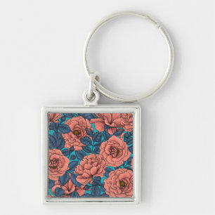 Pink roses with blue leaves on blue key ring