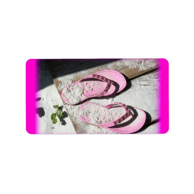 Pink sandy flip flop sandals on Florida beach Label (Front)