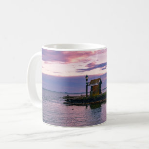 Pink sunset over lake coffee mug