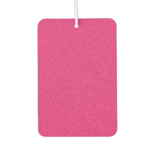 Pink textured surface with subtle swirling pattern car air freshener