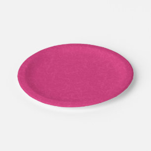 Pink textured surface with subtle swirling pattern paper plate