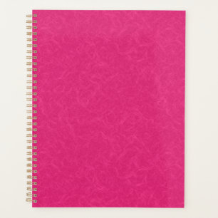Pink textured surface with subtle swirling pattern planner