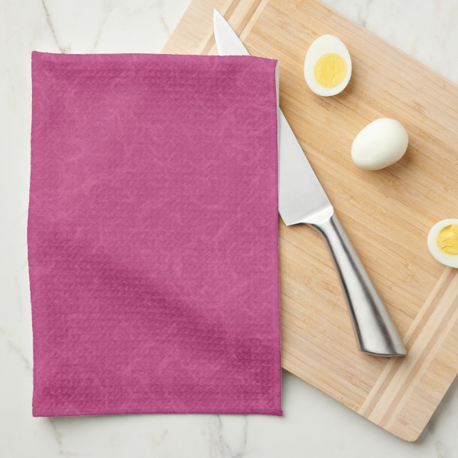 Pink textured surface with swirling pattern tea towel (Quarter Fold)