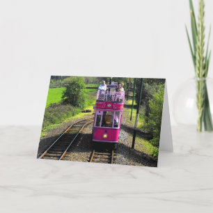 Pink tram at passing place holiday card