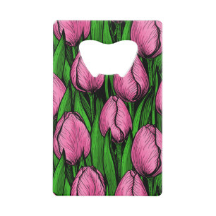 Pink tulips with green leaves