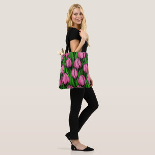 Pink tulips with green leaves tote bag
