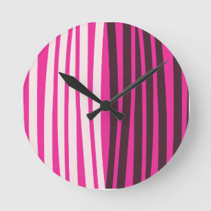 Pink white and black vertical stripes round clock