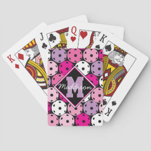 Pink, white and purple pickleballs, with name playing cards