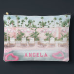 Pink & White Pool Party  Accessory Pouch<br><div class="desc">This trendy Poolside zipper pouch features a row of pool loungers with pink and white striped umbrellas set up near a swimming pool. You can personalise with a name. On the back is a repeat of the front design.</div>