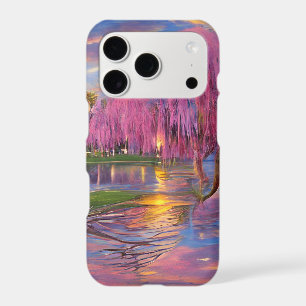 Pink Willow trees at sunset by the pond   