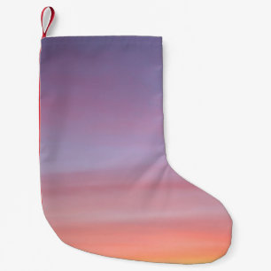 Pink, yellow, and purple cloudy sky small christmas stocking