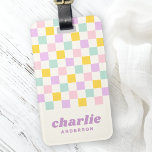 Pink yellow purple blue chequerboard name luggage tag<br><div class="desc">Luggage featuring a light pink,  yellow,  purple and aqua blue chequerboard pattern and your name in a retro style,  purple font with a line of custom text below. All colours are customisable. Add your contact information on the back</div>