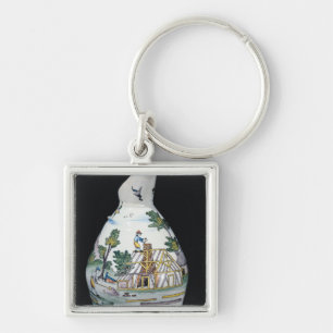 Pitcher depicting the construction of a key ring