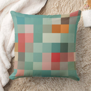 Pixel blocks in blue compliments pattern cushion