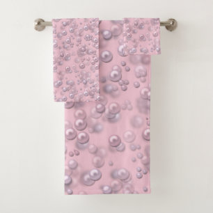Placers of white-pink pearls on pink velvet bath towel set