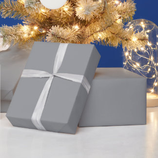 plain grey sheet of material partially unrolled wrapping paper