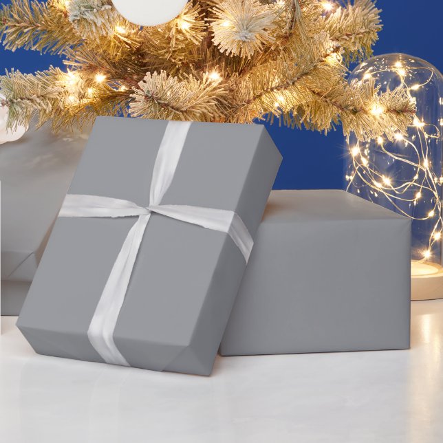 plain grey sheet of material partially unrolled wrapping paper (Holidays)