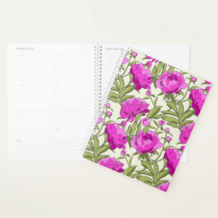 Planner with vintage floral pink patterned cover.