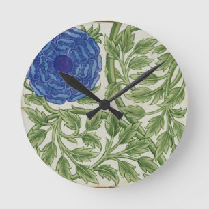 Plant with a blue flower (w/c on paper) round clock