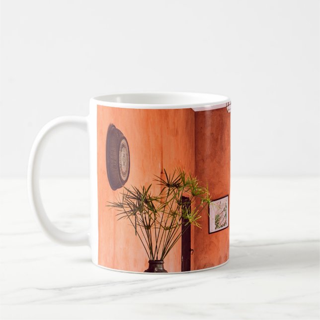 PLANTERS WITH PLANT NEAR AREA RUG INSIDE ROOM COFFEE MUG (Left)