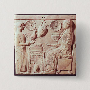 Plaque of a woman offering gifts to a seated 15 cm square badge