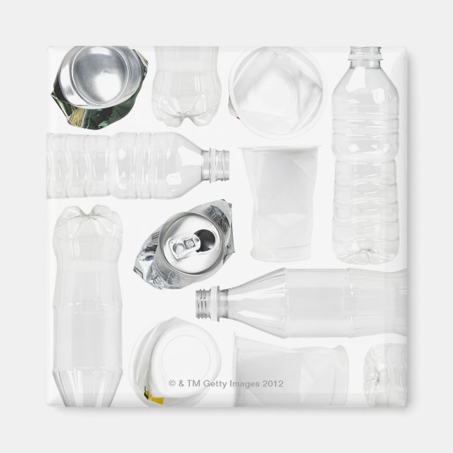 Plastic bottles, cups and alluminum cans shot on magnet (Front)